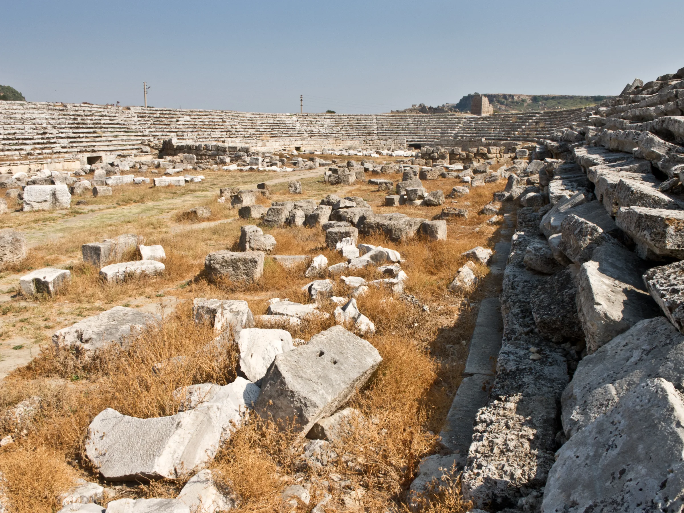 Stone seating and remains of the ancient stadium at Perge